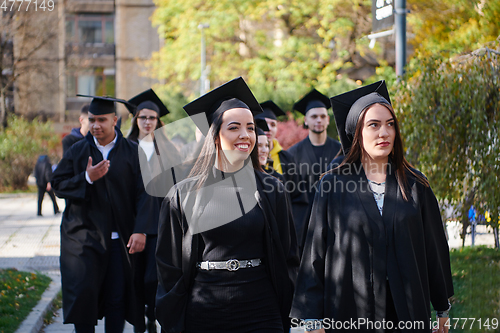 Image of Group of diverse international graduating students celebrating