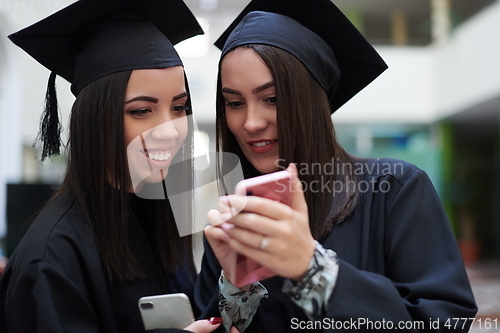 Image of Group of diverse international graduating students celebrating