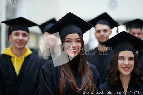 Image of Group of diverse international graduating students celebrating