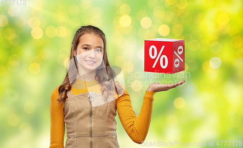 Image of happy teenage girl showing percentage sign