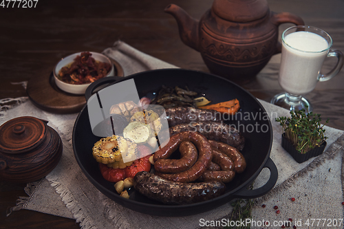 Image of Grilled sausages with vegetables