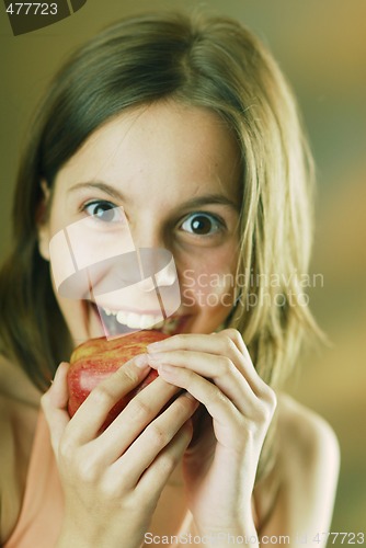 Image of A girl with an apple