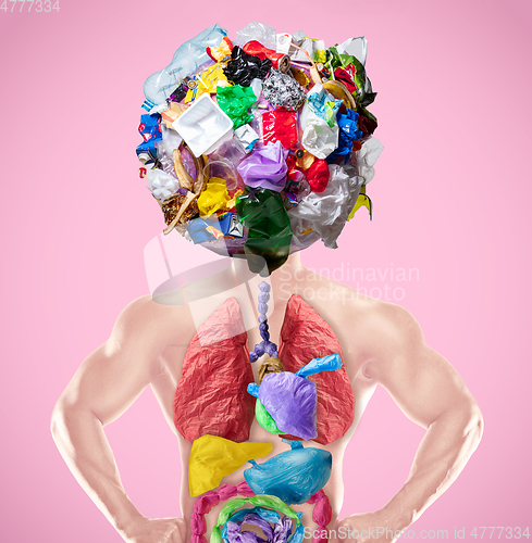 Image of We are what we eat - concept of environmental pollution of plastic