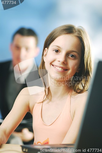 Image of A girl at the notebook