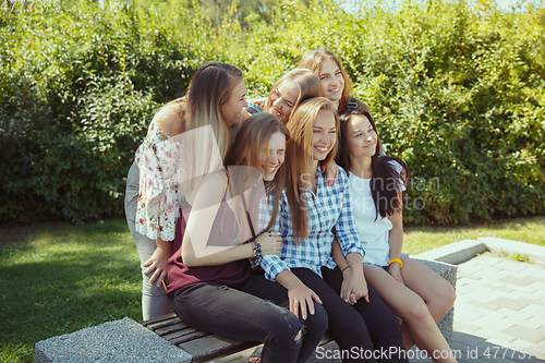 Image of Happy women outdoors on sunny day. Girl power concept.