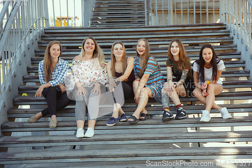 Image of Happy women outdoors on sunny day. Girl power concept.