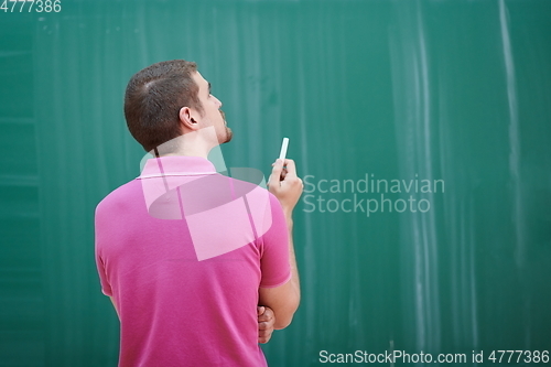 Image of the student does the task on the board