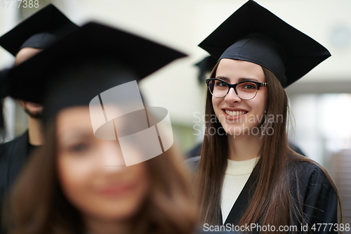 Image of Group of diverse international graduating students celebrating