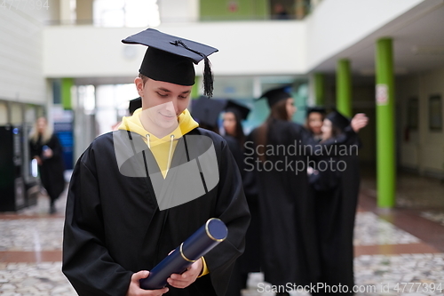 Image of portrait of student during graduation day