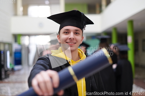 Image of portrait of student during graduation day