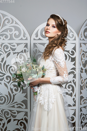 Image of beautiful girl in wedding gown