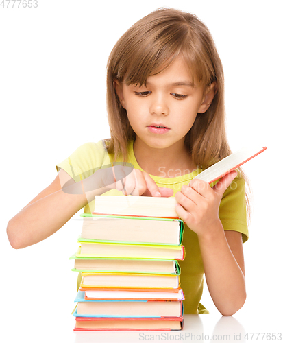 Image of Little girl with her books
