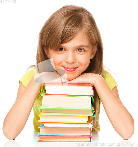 Image of Little girl with her books