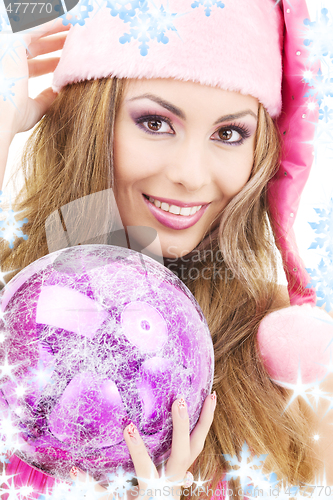 Image of santa helper girl with ball