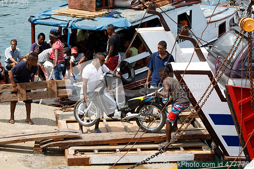 Image of Malagasy peoples loading ship in Nosy Be, Madagascar