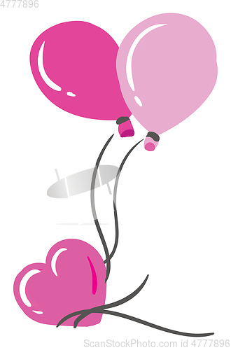 Image of Shades of three pink-colored balloons of different shapes are wi