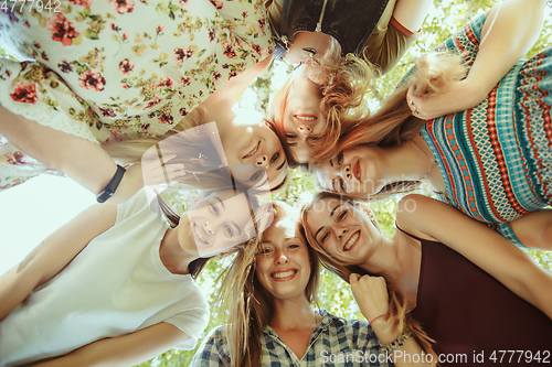 Image of Happy women outdoors on sunny day. Girl power concept.