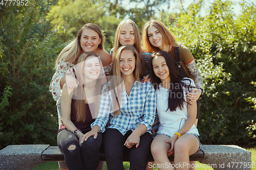 Image of Happy women outdoors on sunny day. Girl power concept.