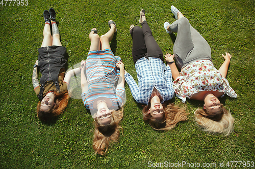 Image of Happy women outdoors on sunny day. Girl power concept.