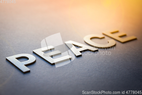 Image of Word peace written with white solid letters