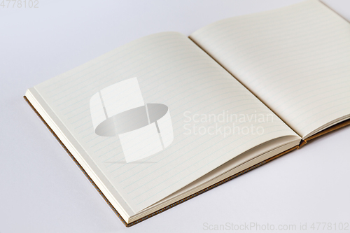 Image of Open blank notebook closeup view