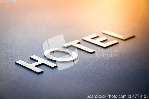 Image of Word hotel written with white solid letters