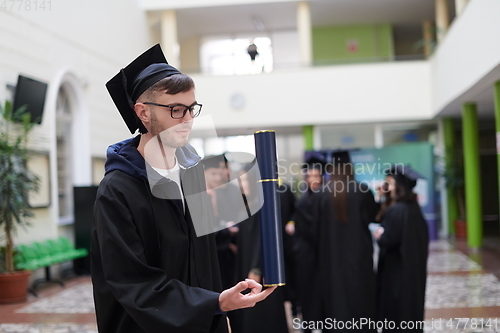 Image of portrait of student during graduation day