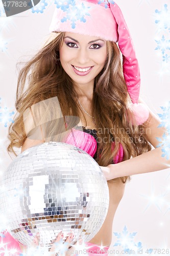 Image of santa helper in pink lingerie with disco ball