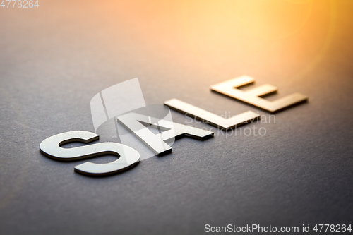 Image of Word sale written with white solid letters