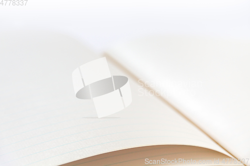 Image of Open blank notebook closeup view