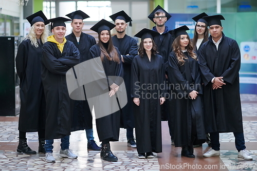 Image of Group of diverse international graduating students celebrating