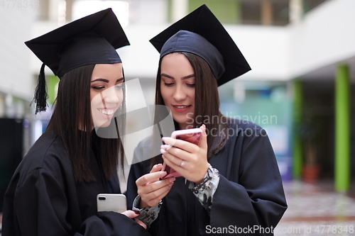 Image of Group of diverse international graduating students celebrating