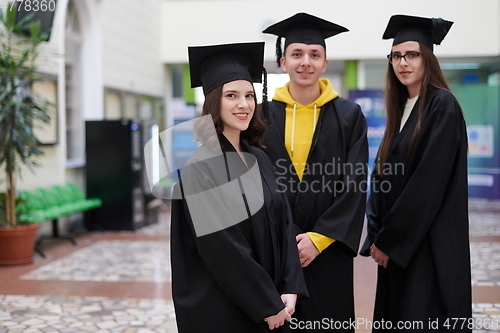 Image of Group of diverse international graduating students celebrating