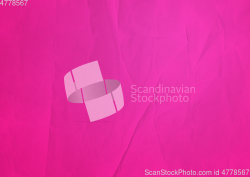 Image of pink crumpled paper texture background