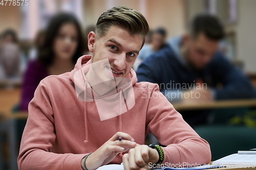 Image of the student uses a smartwatch in math class