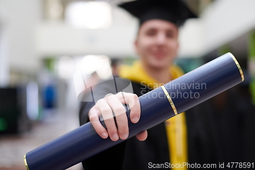 Image of portrait of student during graduation day