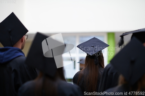 Image of Group of diverse international graduating students celebrating