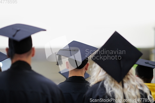 Image of Group of diverse international graduating students celebrating