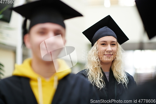 Image of Group of diverse international graduating students celebrating