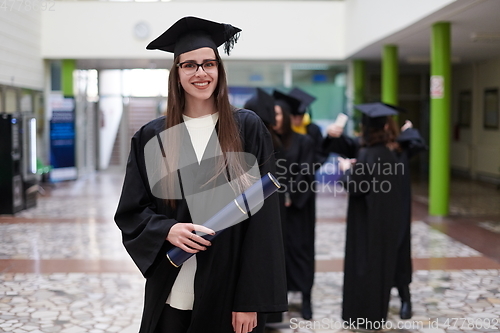 Image of portrait of student during graduation day