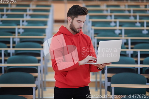 Image of the student uses a notebook in school