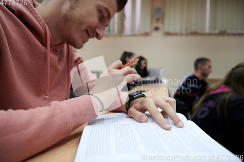 Image of the student uses a smartwatch in math class