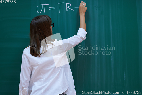 Image of the professor explains the task on the board