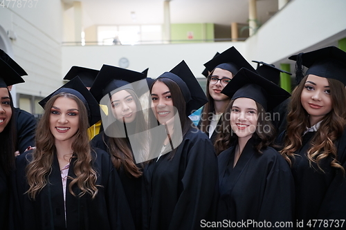 Image of Group of diverse international graduating students celebrating