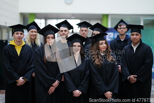 Image of Group of diverse international graduating students celebrating