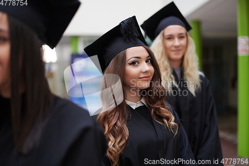 Image of Group of diverse international graduating students celebrating