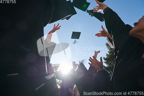 Image of Group of diverse international graduating students celebrating