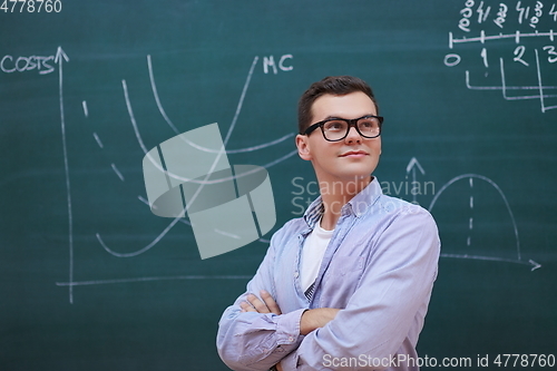 Image of the student does the task on the board