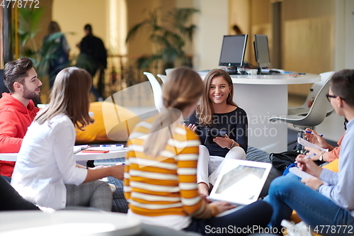 Image of students using modern technology for school project