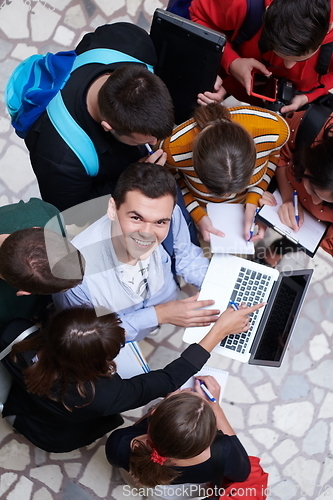 Image of students using modern technology for school project